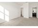 Bright bedroom with neutral carpet and ample closet space at 36944 W Prado St, Maricopa, AZ 85138
