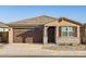Charming single-Gathering home featuring a two-car garage, stone accents, and a modern design at 36944 W Prado St, Maricopa, AZ 85138