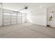 Spacious two-car garage with ample room for parking and storage at 36944 W Prado St, Maricopa, AZ 85138