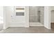 Bathroom with soaking tub and walk-in shower at 36973 W La Paz St, Maricopa, AZ 85138