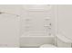 Clean bathroom with shower/tub and shelving at 36973 W La Paz St, Maricopa, AZ 85138