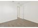Simple bedroom with neutral carpeting at 36973 W La Paz St, Maricopa, AZ 85138