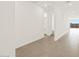 Bright hallway with tile flooring at 36973 W La Paz St, Maricopa, AZ 85138