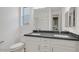 This bright bathroom features double sinks and ample countertop space, perfect for morning routines at 17134 W Hackamore Dr, Surprise, AZ 85387