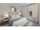 Cozy bedroom with soft, neutral tones and natural light providing a comfortable and inviting ambiance at 17134 W Hackamore Dr, Surprise, AZ 85387
