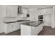 Bright eat-in kitchen featuring sleek countertops and stainless steel appliances at 17134 W Hackamore Dr, Surprise, AZ 85387
