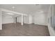 Spacious living room featuring dark wood floors and ample natural light at 17134 W Hackamore Dr, Surprise, AZ 85387