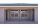 Covered patio featuring access to the interior and an outdoor storage closet at 17134 W Hackamore Dr, Surprise, AZ 85387