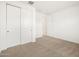 Neutral bedroom featuring carpet, closet, and white walls at 4323 W Josephine St, San Tan Valley, AZ 85144