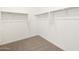 Spacious walk-in closet featuring ample storage and organizational shelving at 4323 W Josephine St, San Tan Valley, AZ 85144