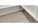 Close-up view of white shelving in a well-lit storage area with neutral flooring at 4323 W Josephine St, San Tan Valley, AZ 85144