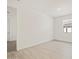 Bright bedroom boasts wood-look flooring and a modern recessed light fixture at 4919 W Hunter Trl, San Tan Valley, AZ 85144