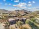 Stunning property with terracotta roof and desert landscaping, offering breathtaking mountain views at 10801 E Happy Valley Rd # 27, Scottsdale, AZ 85255
