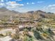 Expansive estate home showcasing architectural details and beautiful desert landscape views at 10801 E Happy Valley Rd # 27, Scottsdale, AZ 85255