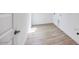 Laundry room with tiled floors and natural light at 25149 N 171St Ave, Surprise, AZ 85387