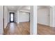 Open-concept space featuring wood-look flooring, bright walls and plenty of light at 25149 N 171St Ave, Surprise, AZ 85387