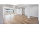 Bright open living room with wood-style tile flooring and abundant natural light at 25149 N 171St Ave, Surprise, AZ 85387