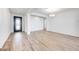 Open living space featuring wood-look flooring, bright lighting and light walls at 25149 N 171St Ave, Surprise, AZ 85387