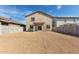 A large, flat backyard with a covered patio, block wall fencing, and lawn potential at 8552 N 170Th Ln, Waddell, AZ 85355