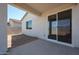 Covered back patio with a concrete flooring, ready for outdoor enjoyment and relaxation at 40010 W Bravo Dr, Maricopa, AZ 85138