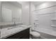 Bathroom with granite vanity and shower-tub combo at 40010 W Bravo Dr, Maricopa, AZ 85138