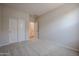 Bedroom with a closet featuring sliding doors at 40010 W Bravo Dr, Maricopa, AZ 85138