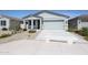 Charming single-story home featuring a well-manicured front yard and inviting entrance at 40010 W Bravo Dr, Maricopa, AZ 85138