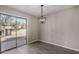 Cozy dining area with sliding glass door leading to the backyard at 574 W Kingman Dr, Casa Grande, AZ 85122