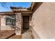 Front entry with security door and stucco exterior at 574 W Kingman Dr, Casa Grande, AZ 85122