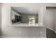 Kitchen with white cabinets, quartz counters, and stainless steel appliances at 574 W Kingman Dr, Casa Grande, AZ 85122