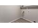 Laundry room with vinyl flooring and shelving at 574 W Kingman Dr, Casa Grande, AZ 85122