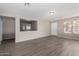 Open living area showcasing neutral decor and wood-look flooring at 574 W Kingman Dr, Casa Grande, AZ 85122