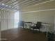 Cozy porch with comfortable seating, awning, and railing, ideal for enjoying outdoor living at 8700 E University Dr # 2020, Mesa, AZ 85207