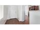Inviting entryway with white walls and wood-look floors at 26058 W Yukon Dr, Buckeye, AZ 85396