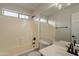 Clean bathroom with shower/tub combo and updated vanity at 3011 E Colonial Pl, Chandler, AZ 85249