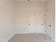 Simple bedroom with double door closet and neutral decor at 3011 E Colonial Pl, Chandler, AZ 85249