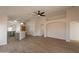 Open floor plan living area showcasing kitchen and entryway at 3011 E Colonial Pl, Chandler, AZ 85249