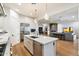 Open concept kitchen features stainless steel appliances and a large island at 7240 N 13Th Ln, Phoenix, AZ 85021