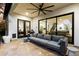 Covered patio with seating area, ceiling fan and access to backyard at 7240 N 13Th Ln, Phoenix, AZ 85021