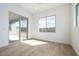 Bedroom with tile floors, recessed lighting, large sliding glass door, and a window at 829 W Golden Ore Pass, Apache Junction, AZ 85120