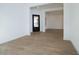 Open layout, with an entry door and recessed lighting, featuring wood-look floors at 829 W Golden Ore Pass, Apache Junction, AZ 85120