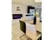 Elegant dining area with modern table and chairs, adjacent to fireplace at 272 Leisure World --, Mesa, AZ 85206