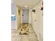 Clean entryway with tile flooring and geometric patterned rug at 272 Leisure World --, Mesa, AZ 85206