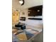 Living room with electric fireplace and large TV at 272 Leisure World --, Mesa, AZ 85206