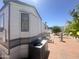 Charming home exterior with desert landscaping and a well-maintained exterior at 225 S Motherlode Dr, Apache Junction, AZ 85119