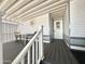 Inviting front porch featuring a table and chairs for relaxing outdoors at 225 S Motherlode Dr, Apache Junction, AZ 85119