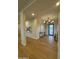 Spacious foyer with modern lighting and views of the front entry at 25219 S 194Th St, Queen Creek, AZ 85142