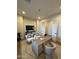 Bright and airy home office with a modern desk, chairs, decor and sliding doors for access at 25219 S 194Th St, Queen Creek, AZ 85142