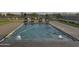Sparkling pool with lounge chairs and lush landscaping, perfect for outdoor entertaining at 25219 S 194Th St, Queen Creek, AZ 85142