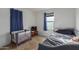 Guest bedroom with daybed and crib at 3714 S 58 Dr, Phoenix, AZ 85043